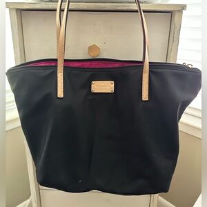 Black Kate Spade with hot pink interior!